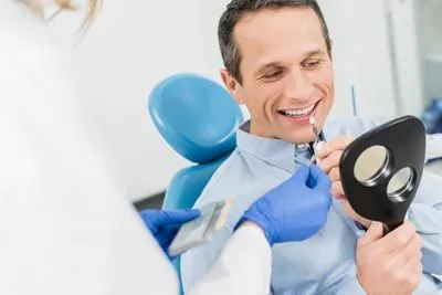man choosing dental veneers in Olympia, WA