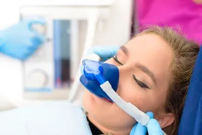 woman sleeping during her dental services at Capitol Lake Dentistry